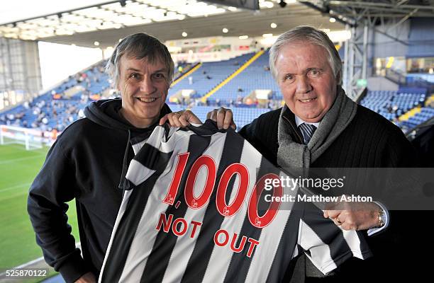 David Watkin is presented with a '1000 not out' shirt for attending 1000 consecutive West Bromwich Albion matches by Albion legend Bobby Hope