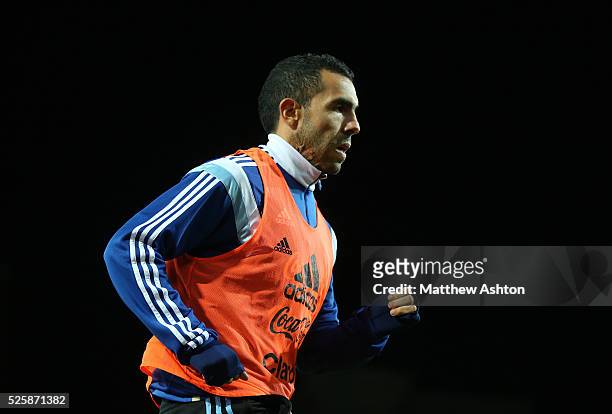 Carlos Tevez of Argentina warms up
