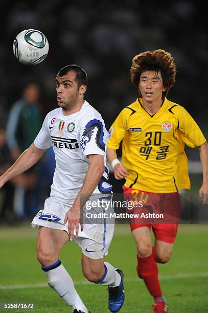 Goran Pandev of FC Internazionale Milano and Jo Jae Cheol of Seongnam Ilhwa Chunma FC