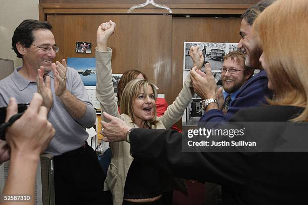 San Francisco Chronicle photographer Deanne Fitzmaurice celebrates after winning the Pulitzer Prize in feature photography April 4, 2005 in San...