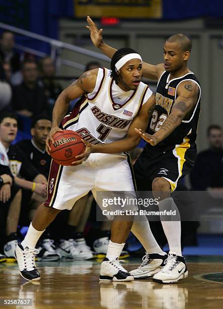 Jermaine Watson of the Boston College Eagles looks to pass around Ed McCants of the Wisconsin-Milwaukee Panthers during the second round of the 2005...