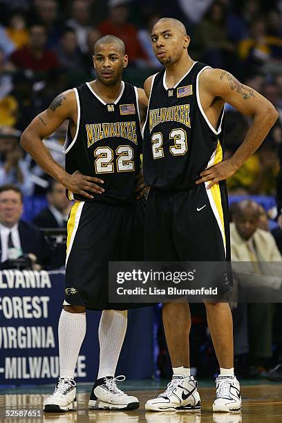 Ed McCants and James Wright of the Wisconsin-Milwaukee Panthers stand on the court during the game with the Boston College Eagles in the second round...