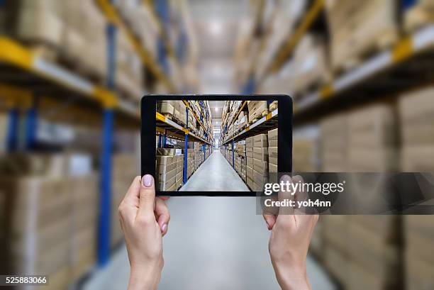 ordering on-line from modern warehouse - digital shopping stockfoto's en -beelden