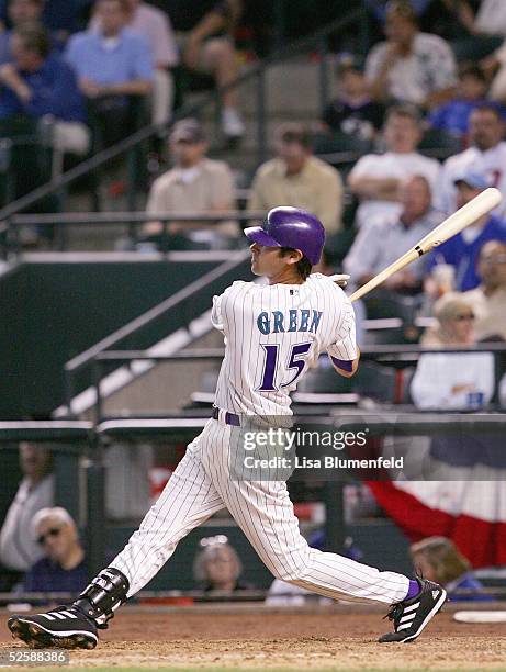 Shawn Green of the Arizona Diamondbacks hits a single in the seventh inning against the Chicago Cubs during the Diamondbacks home opener on April 4,...