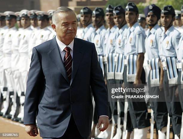 President of the Republic of Uzbekistan Islam A. Karimov inspects a guard of honour of Indian troops during a ceremonial reception at The...
