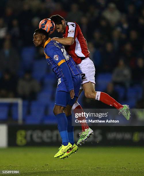 Jean-Louis Akpa Akpro of Shrewsbury Town and Ben Purkiss of Walsall