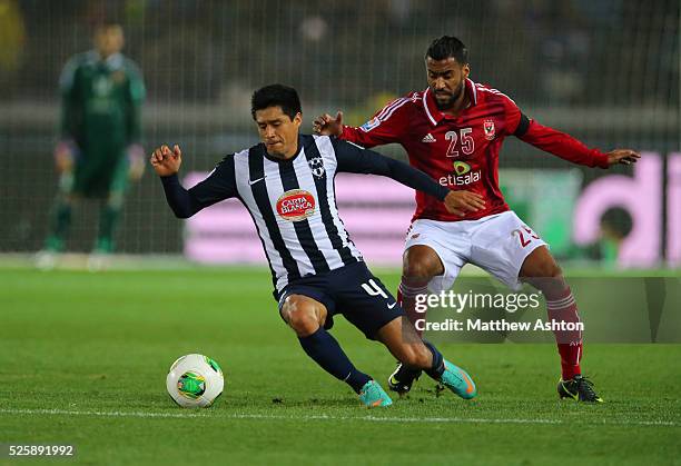 Ricardo Osorio of Club de Futbol Monterrey and Hossam Ashour of Al-Ahly SC