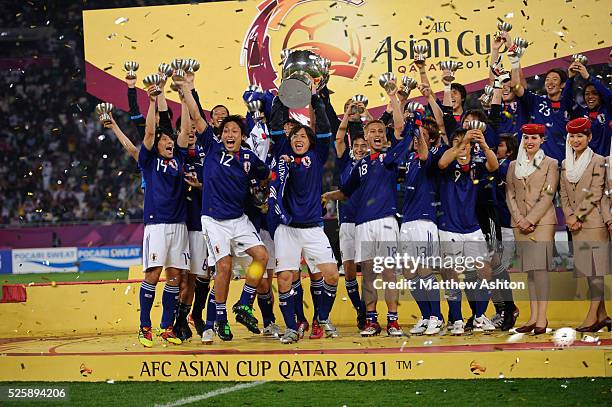 Yasuhito Endo of Japan with the Asian Cup trophy after defeating Australia 0-1 in the 2011 Final