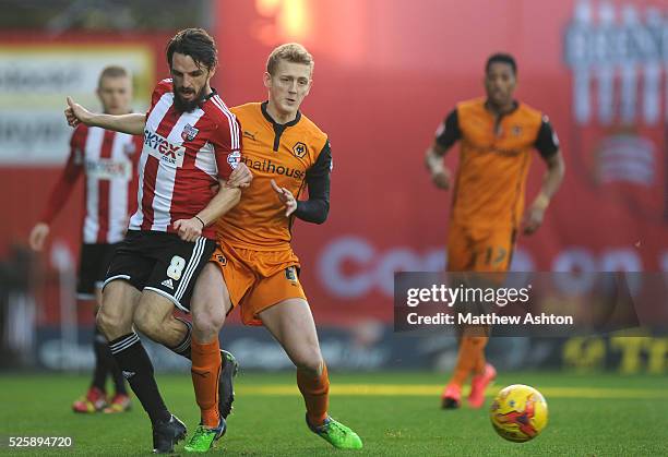 George Saville of Wolverhampton Wanderers and Jonathan Douglas of Brentford