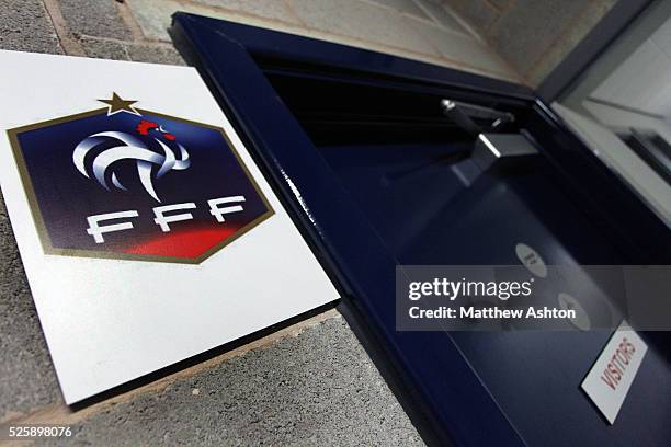 The France team crest outside the visitors changing room at the Greenhouse Meadow Stadium, home of Shrewsbury Town