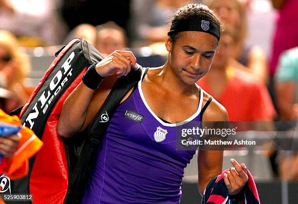 Heater Watson of Great Britain walks off court following her loss at the Australian Open, 2013