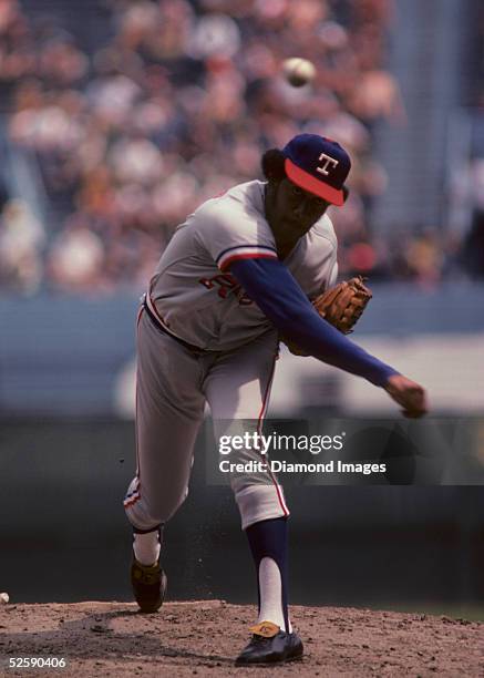 Pitcher Fergie Jenkins of the Texas Rangers follows through on a pitch during a game on August 18, 1974 against the Cleveland Indians at Municipal...