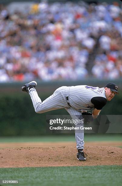 Curt Schilling of the Arizona Diamondbacks pitches during the game at Wrigley Field in Chicago, Illinois on August 17, 2002. Curt Schilling played...