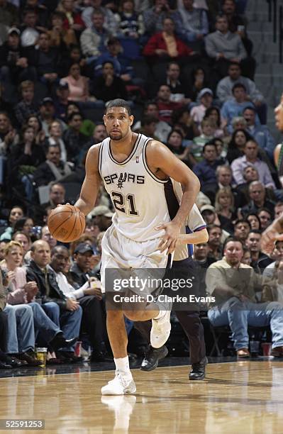 Tim Duncan of the San Antonio Spurs advances the ball upcourt during the NBA game against the Minnesota Timberwolves at the SBC Center on March 16,...