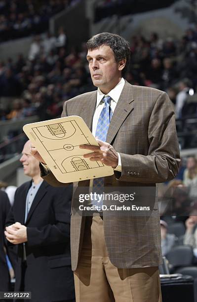 Head Coach Kevin McHale of the Minnesota Timberwolves looks on from the sideline with clipboard in hand during the NBA game against the San Antonio...