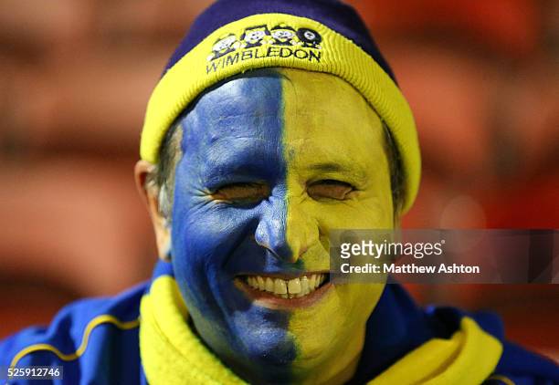 Fan of AFC Wimbledon with a painted face