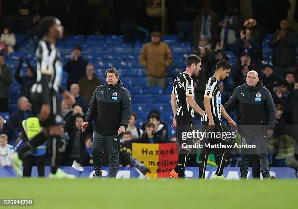 John Carver caretaker manager of Newcastle United and Steve Stone first team coach of Newcastle United watch as their dejected team walk off at the...