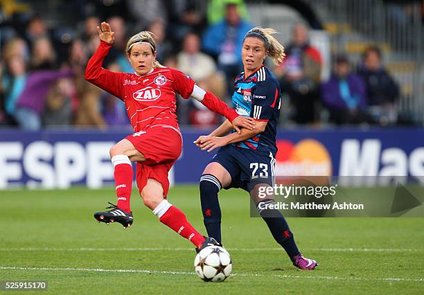 Jennifer Zietz of FFC Turbine Potsdam and Camille Abily of Olympique Lyonnais