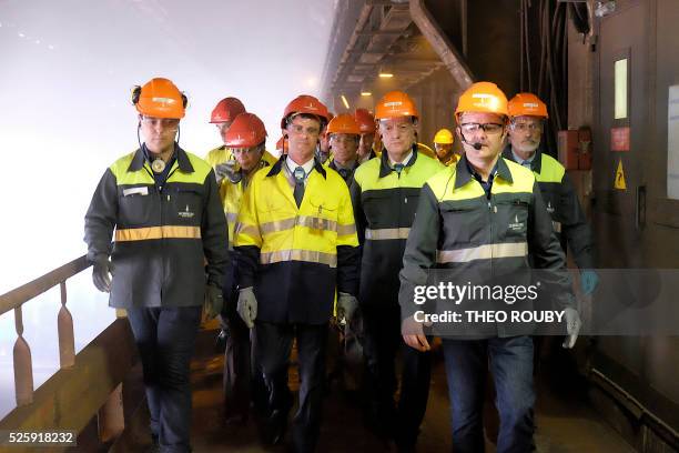 French Prime Minister Manuel Valls and French Overseas Territories minister George Pau-Langevin visit the metallurgic factory SLN with French CEO of...