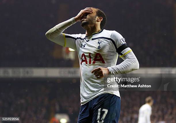 Andros Townsend of Tottenham Hotspur covers his face