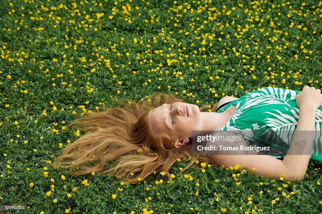 Woman Napping in a Meadow