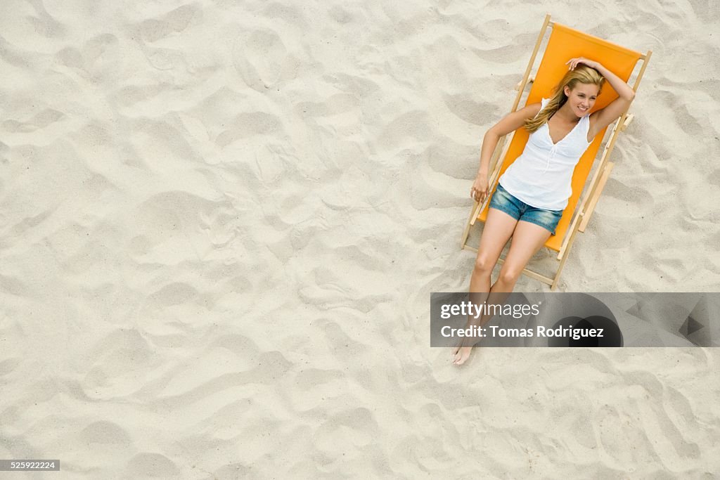 Woman Relaxing on a Beach