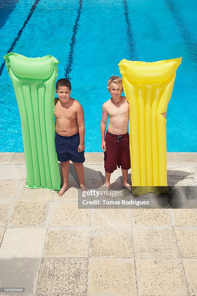 Boy Inflatable Raft Boys Holding Inflatable Rafts High-Res Stock Photo - Getty Images