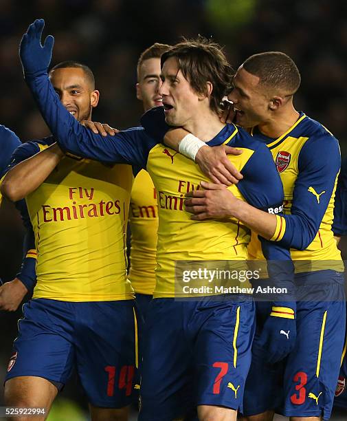 Tomas Rosicky of Arsenal celebrates after scoring to make it 1-3 with his team mates