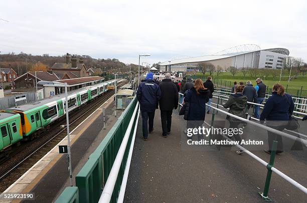 Fans make their way, from Falmer train station, to the American Express Community stadium, home of Brighton & Hove Albion - Amex stadium