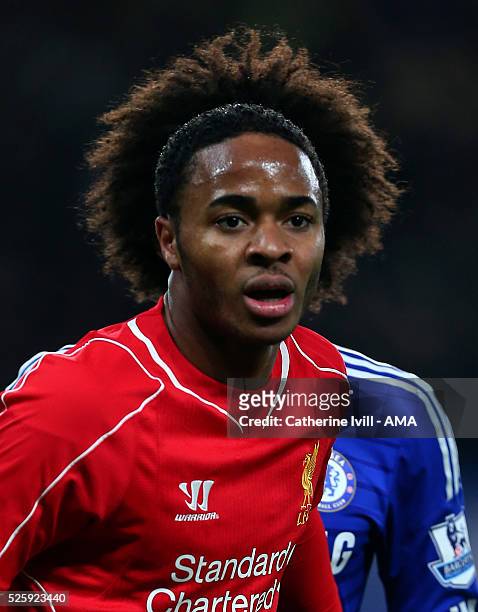 Raheem Sterling of Liverpool with his short hair stands infront of Willian of Chelsea