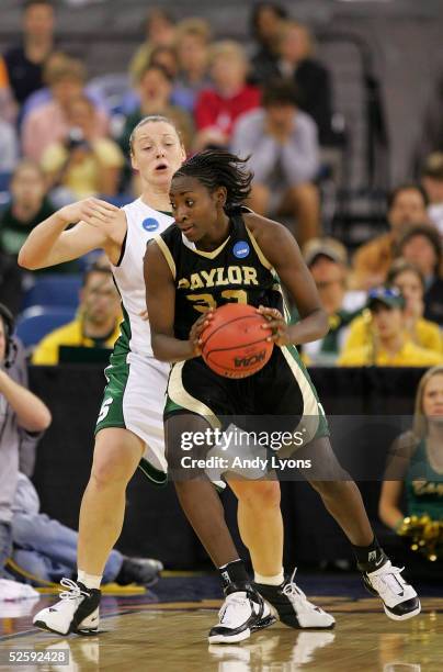 Sophia Young of the Baylor Lady Bears moves around Liz Shimek of the Michigan State Spartans in the 2005 Women's NCAA Basketball National...
