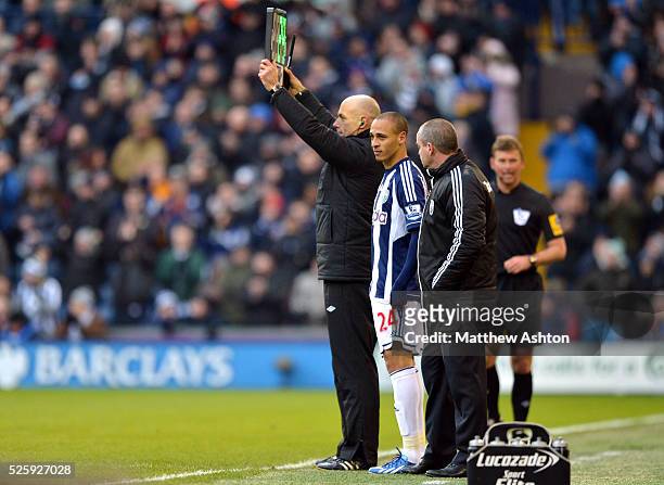 Peter Odemwingie of West Bromwich Albion prepares to come on as a substitute - his first appearance since transfer deadline day when he went to QPR