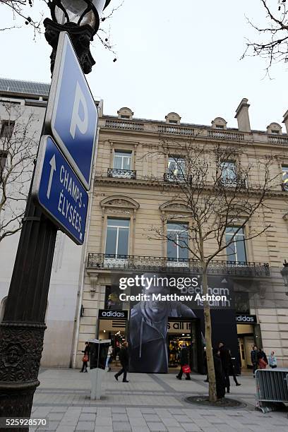 An image of David Beckham of Paris Saint-Germain on the front of the Adidas shop on the Champs Elysees in the city of Paris