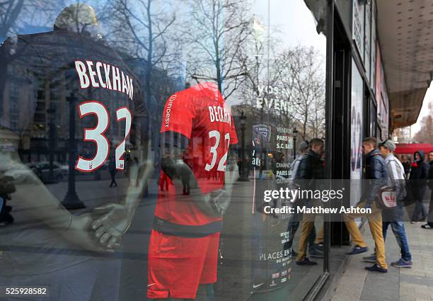 Shirts of David Beckham of Paris Saint-Germain in the shop window of the Nike PSG shop on the Champs Elysees in the city of Paris