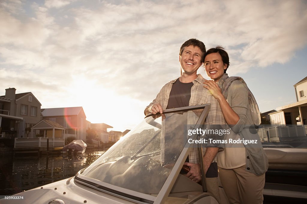 Couple on motorboat