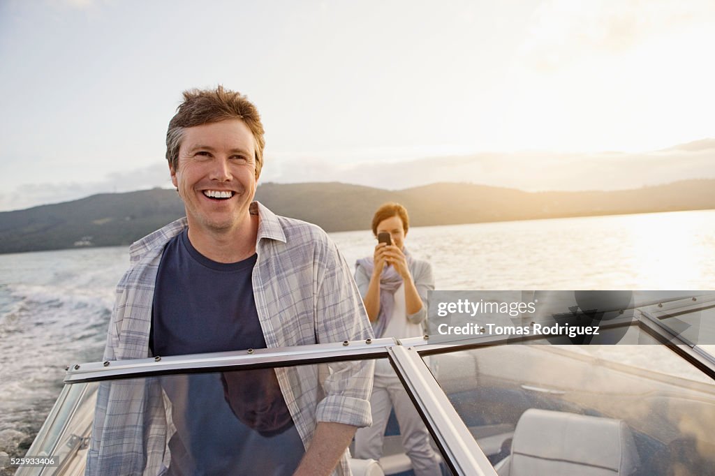 Couple on motorboat