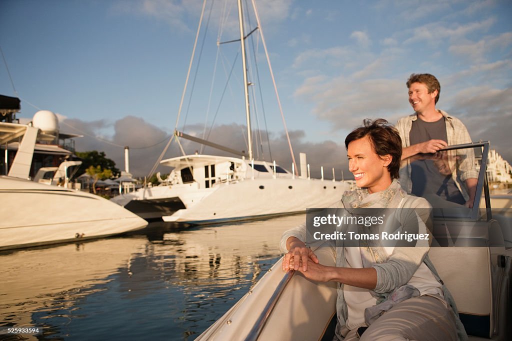 Couple on motorboat