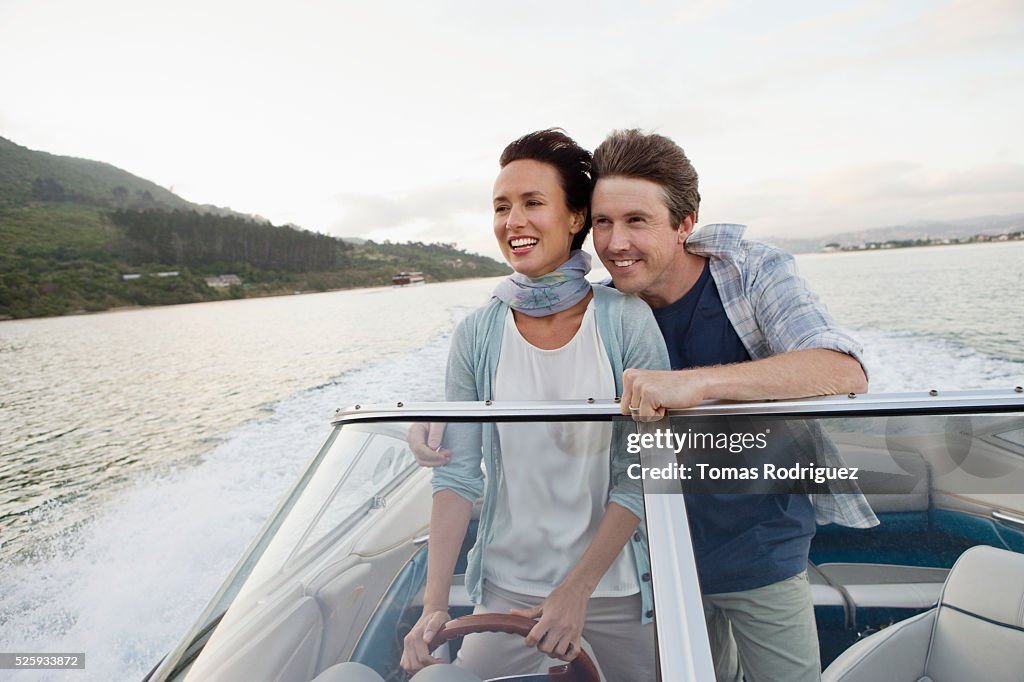 Couple on motorboat