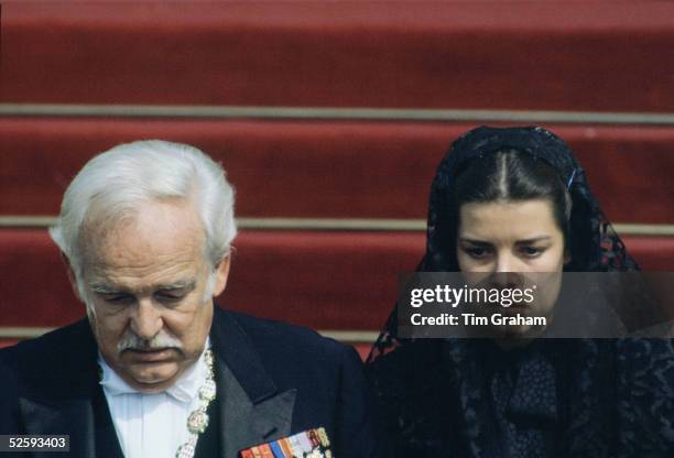 Prince Rainier of Monaco, accompanied by his daughter Princess Caroline wearing a black lace mantilla, attending the funeral of his wife Princess...