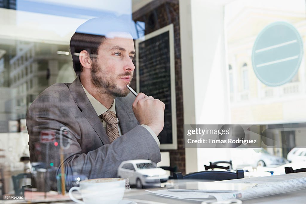 Businessmen sitting in cafe