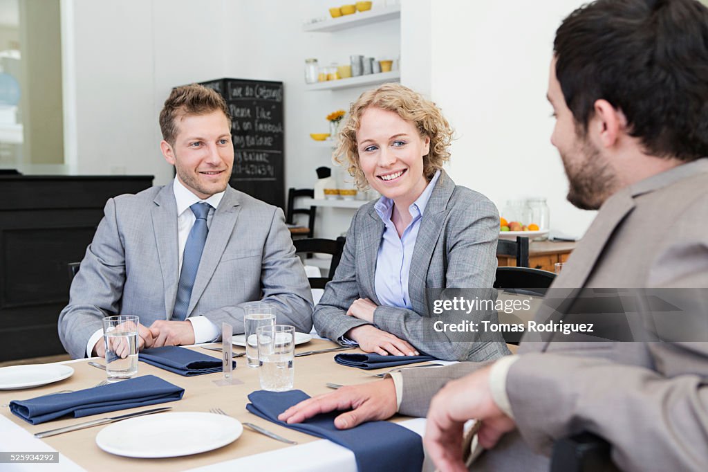 Business people sitting in restaurant