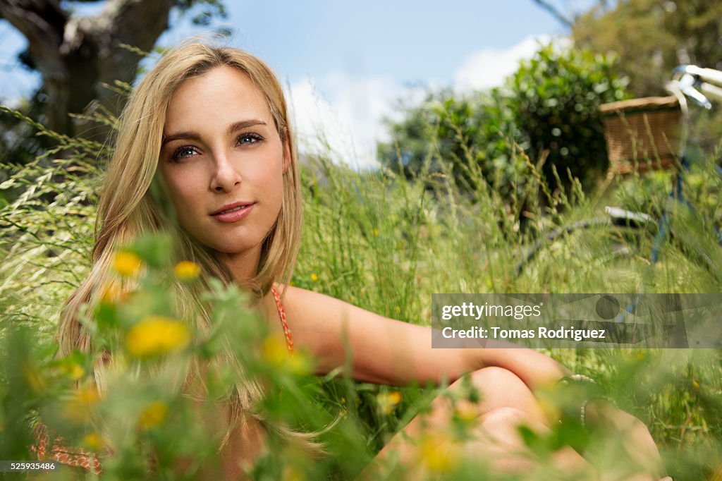 Portrait of young woman relaxing at summer