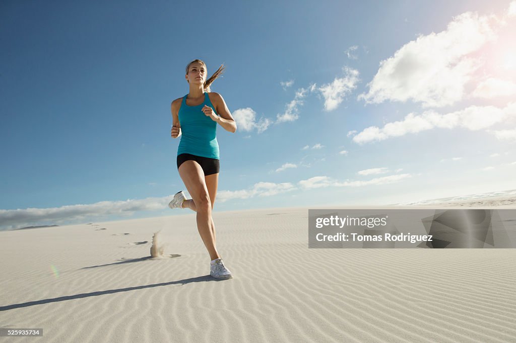 View of, young adult woman jogging