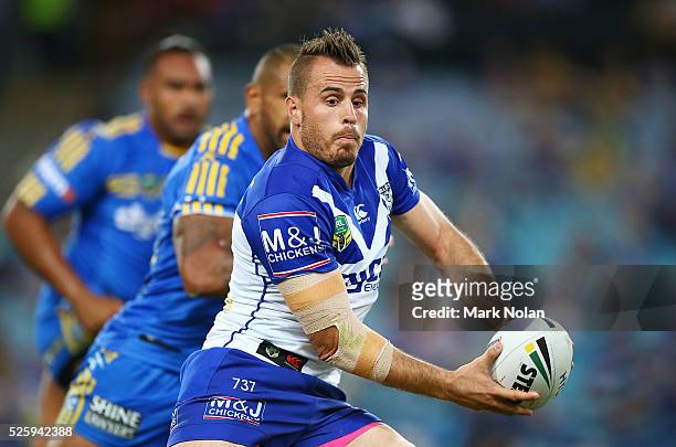 Josh Reynolds of the Bulldogs looks to pass during the round nine NRL match between the Parramatta Eels and the Canterbury Bulldogs at ANZ Stadium on...