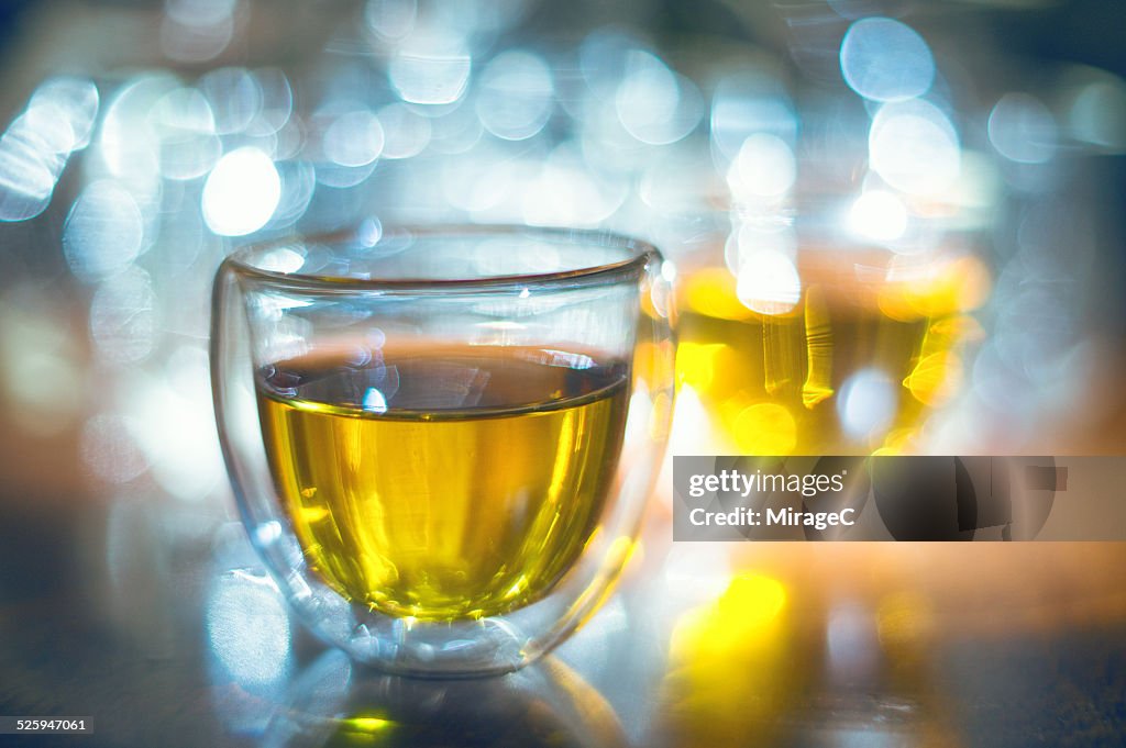 Glass tea cup with soft bokeh