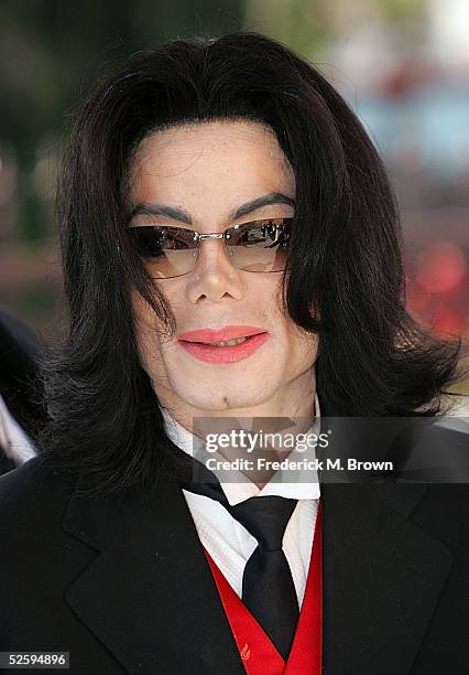 Singer Michael Jackson arrives to the funeral services for lawyer Johnnie L. Cochran, Jr. At the West Angeles Cathedral on April 6, 2005 in Los...