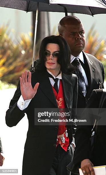Singer Michael Jackson arrives to the funeral services for lawyer Johnnie L. Cochran, Jr. At the West Angeles Cathedral on April 6, 2005 in Los...