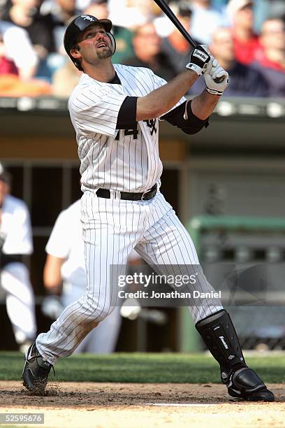 Paul Konerko of the Chicago White Sox throws the ball in during the game with the Cleveland Indians on April 4, 2005 at U.S. Cellular Field in...