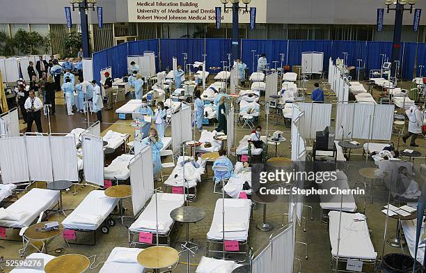 People participate in the surgical triage area during the TOPOFF3 exercise at Robert Wood Johnson University Hospital April 6, 2005 in New Brunswick,...