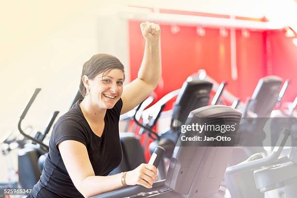 she succeeded in her workout - bike handle stock pictures, royalty-free photos & images
